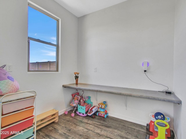 4132 W Tunnel Mine Rd, New River, AZ 85087 - rec room with healthy amount of natural light, wood finished floors, and baseboards