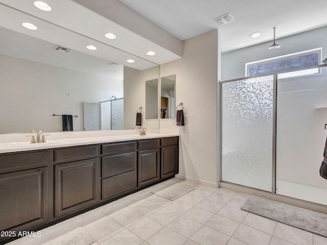 4132 W Tunnel Mine Rd, New River, AZ 85087 - full bath with a shower with door, recessed lighting, double vanity, and tile patterned floors