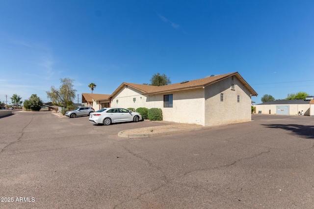 view of front of property featuring stucco siding