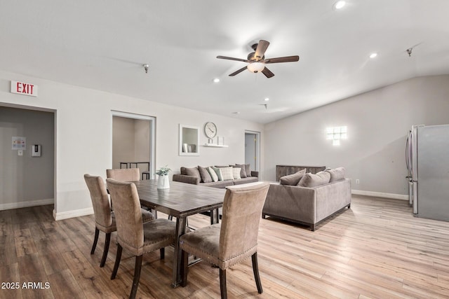 dining space with a ceiling fan, light wood finished floors, baseboards, and recessed lighting