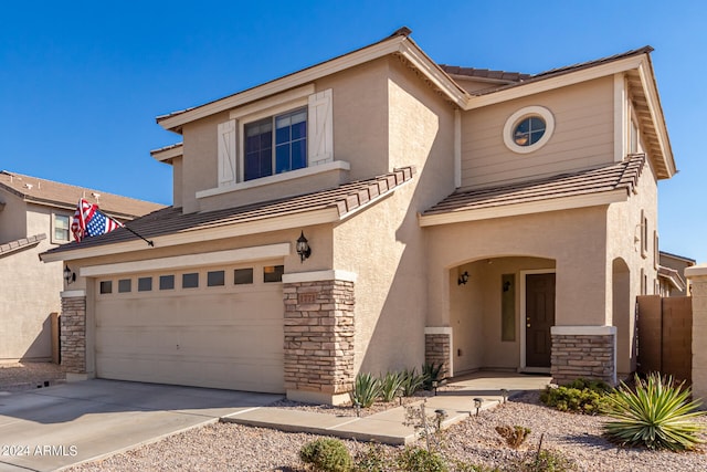 front of property featuring a garage