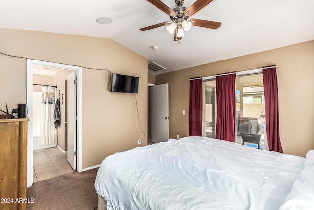 carpeted bedroom with vaulted ceiling and ceiling fan