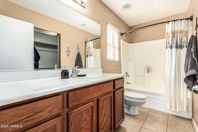 full bathroom featuring toilet, shower / bath combo, vanity, and tile patterned flooring