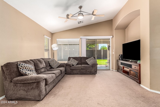 living room featuring lofted ceiling, carpet, and ceiling fan