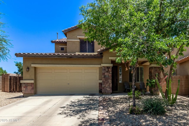 7031 W Lone Tree Trl, Peoria, AZ 85383 - view of front of house featuring stone siding, concrete driveway, stucco siding, and a tiled roof