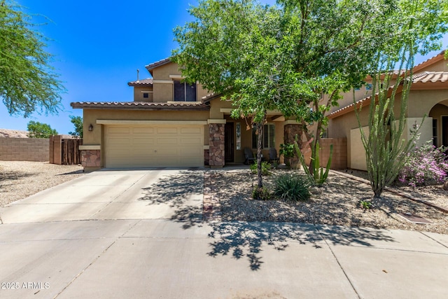 7031 W Lone Tree Trl, Peoria, AZ 85383 - mediterranean / spanish-style house with stucco siding, a tiled roof, concrete driveway, a garage, and stone siding