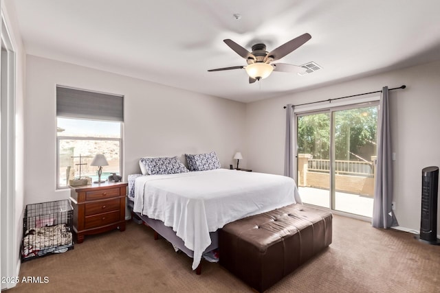7031 W Lone Tree Trl, Peoria, AZ 85383 - bedroom with access to outside, carpet flooring, and ceiling fan