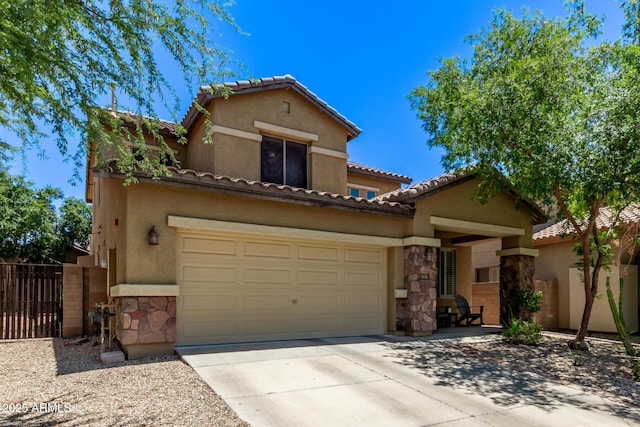 7031 W Lone Tree Trl, Peoria, AZ 85383 - mediterranean / spanish-style house featuring stone siding, concrete driveway, stucco siding, and a tiled roof