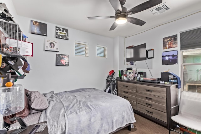 7031 W Lone Tree Trl, Peoria, AZ 85383 - bedroom with carpet and ceiling fan