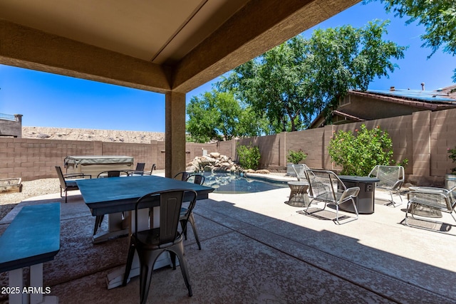 7031 W Lone Tree Trl, Peoria, AZ 85383 - fenced backyard featuring a patio, outdoor dining area, and a fire pit