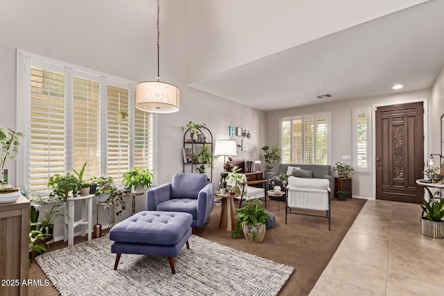 7031 W Lone Tree Trl, Peoria, AZ 85383 - living area with tile patterned floors and recessed lighting