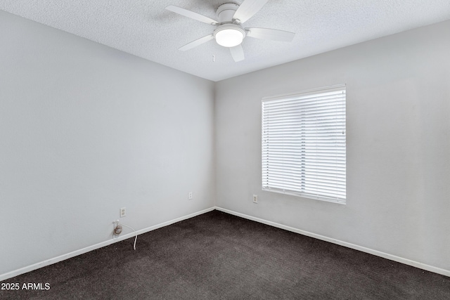 3106 S Extension Rd, Mesa, AZ 85210 - spare room featuring a ceiling fan, dark carpet, a textured ceiling, and baseboards