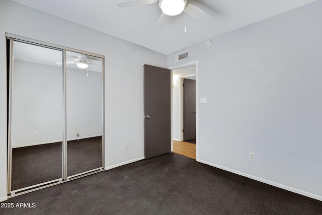 3106 S Extension Rd, Mesa, AZ 85210 - unfurnished bedroom with a closet, baseboards, and ceiling fan