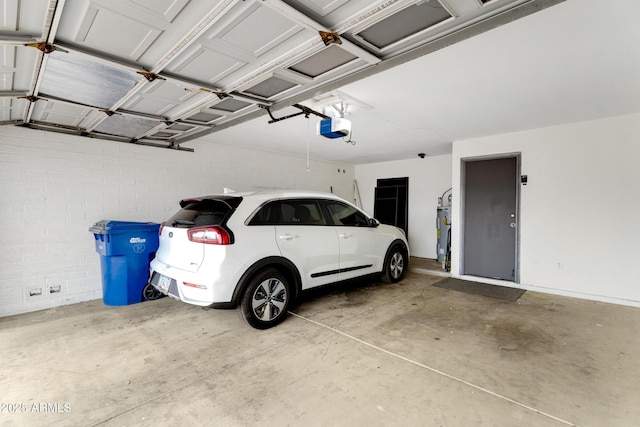 3106 S Extension Rd, Mesa, AZ 85210 - garage featuring a garage door opener and gas water heater
