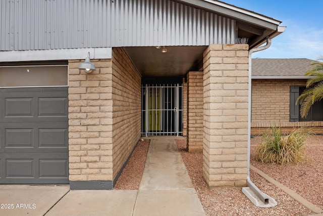 3106 S Extension Rd, Mesa, AZ 85210 - property entrance featuring brick siding and an attached garage