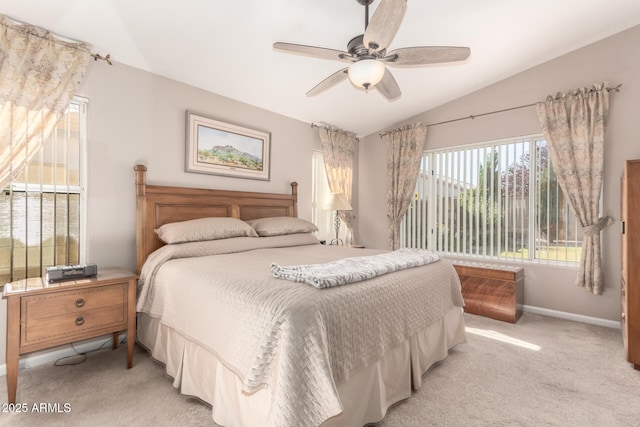 3412 E Kristal Way, Phoenix, AZ 85050 - bedroom with lofted ceiling, light colored carpet, baseboards, and ceiling fan