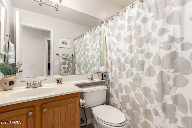 3412 E Kristal Way, Phoenix, AZ 85050 - bathroom featuring toilet, vanity, and a shower with shower curtain