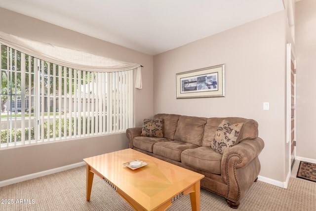 3412 E Kristal Way, Phoenix, AZ 85050 - living room with baseboards and light carpet