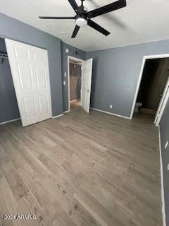 unfurnished bedroom with wood-type flooring and ceiling fan