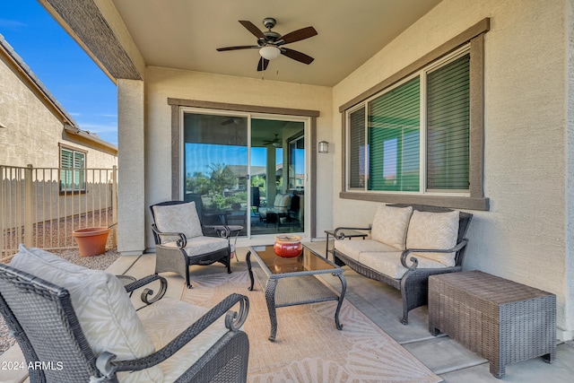 view of patio featuring an outdoor living space and ceiling fan