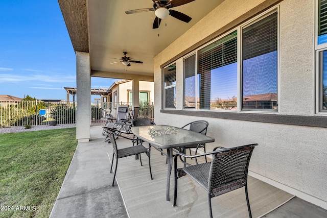 view of patio with ceiling fan