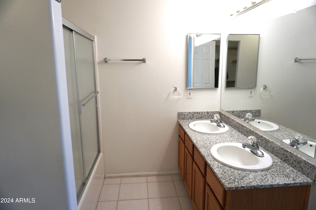 bathroom featuring tile patterned floors and vanity