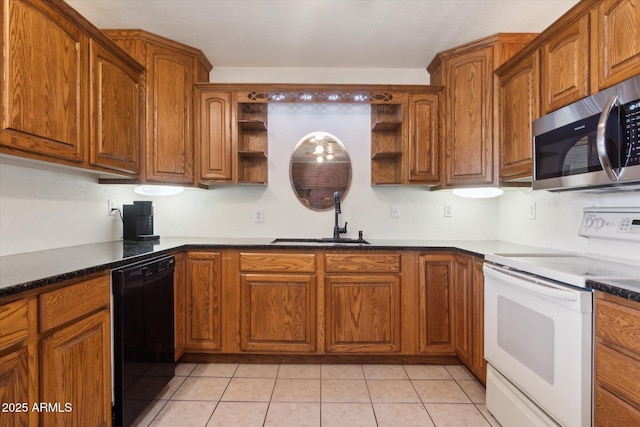 kitchen with sink, light tile patterned floors, electric range, dishwasher, and dark stone counters