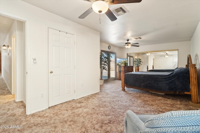 bedroom with ceiling fan and light colored carpet