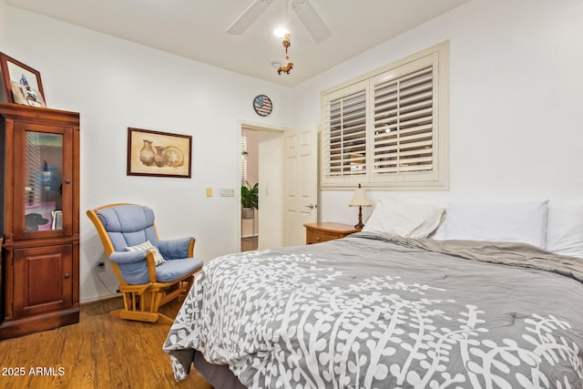 3381 E Canary Way, Chandler, AZ 85286 - bedroom with wood finished floors, a ceiling fan, and baseboards