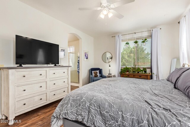 3381 E Canary Way, Chandler, AZ 85286 - bedroom featuring arched walkways, dark wood-type flooring, and connected bathroom