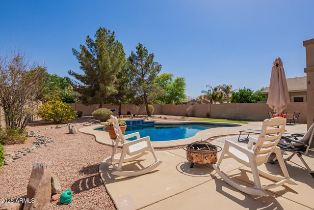 3381 E Canary Way, Chandler, AZ 85286 - view of swimming pool with an outdoor fire pit, a fenced backyard, and a patio area