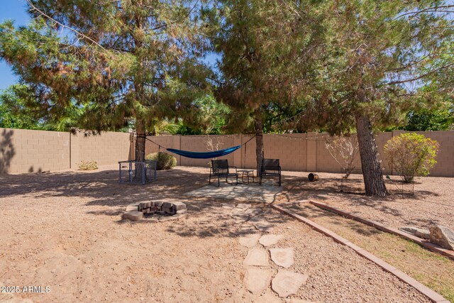 3381 E Canary Way, Chandler, AZ 85286 - view of yard featuring fence and a fire pit