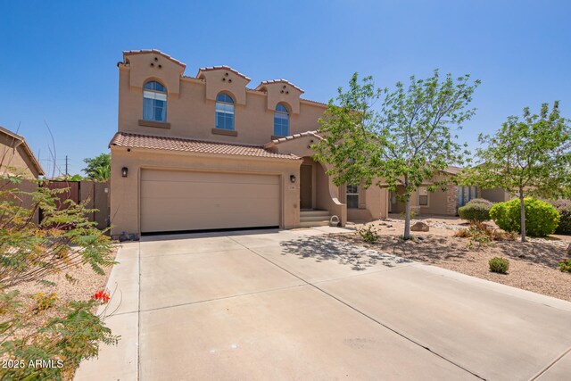 3381 E Canary Way, Chandler, AZ 85286 - view of front facade featuring concrete driveway, stucco siding, a tile roof, and fence