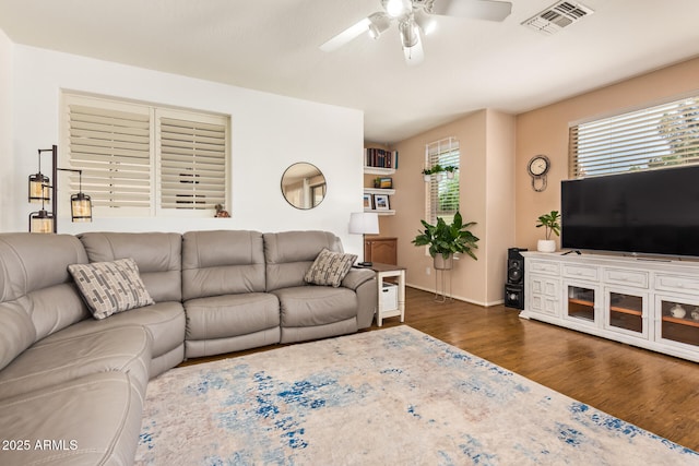 3381 E Canary Way, Chandler, AZ 85286 - living area featuring a ceiling fan, dark wood-type flooring, and baseboards