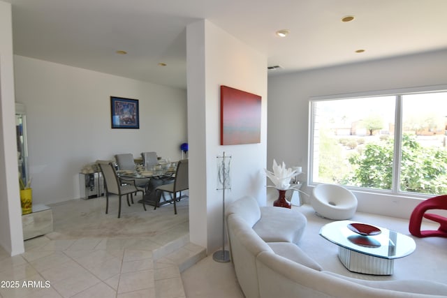 2570 E Manzanita St, Apache Junction, AZ 85119 - living area featuring healthy amount of natural light, light carpet, light tile patterned flooring, and recessed lighting