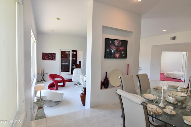 2570 E Manzanita St, Apache Junction, AZ 85119 - dining room with light tile patterned flooring, recessed lighting, and light colored carpet