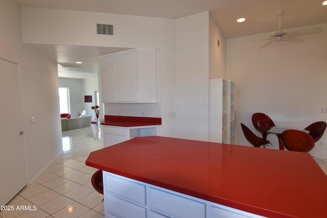 2570 E Manzanita St, Apache Junction, AZ 85119 - kitchen featuring a ceiling fan, light tile patterned floors, white cabinets, and recessed lighting