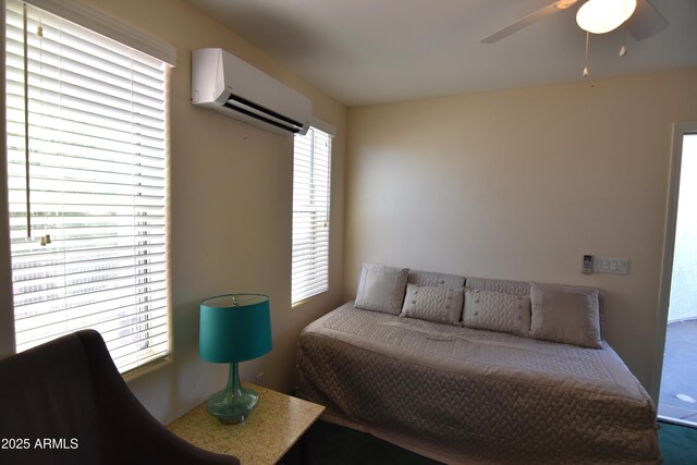 2570 E Manzanita St, Apache Junction, AZ 85119 - bedroom featuring a wall unit AC, carpet, and a ceiling fan