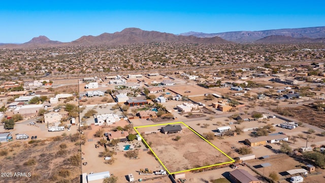 drone / aerial view featuring a mountain view