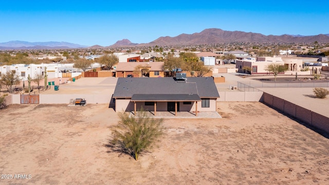 drone / aerial view featuring a mountain view