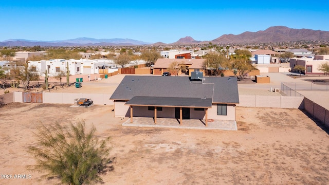 drone / aerial view featuring a mountain view