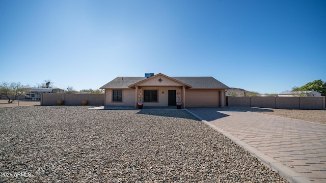 view of front of home with a garage