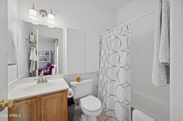 full bathroom with toilet, shower / tub combo, vanity, and tile patterned floors