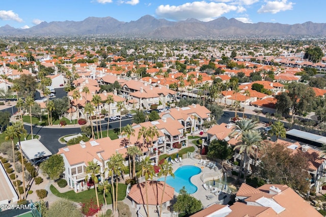 drone / aerial view with a residential view and a mountain view