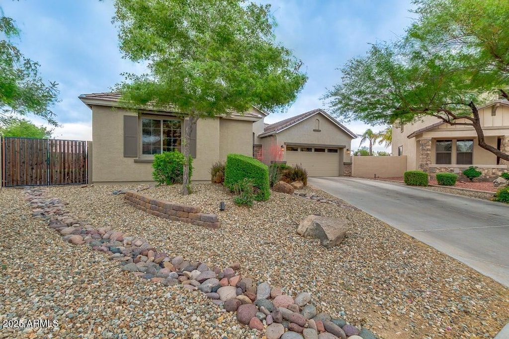 view of front of property with a garage