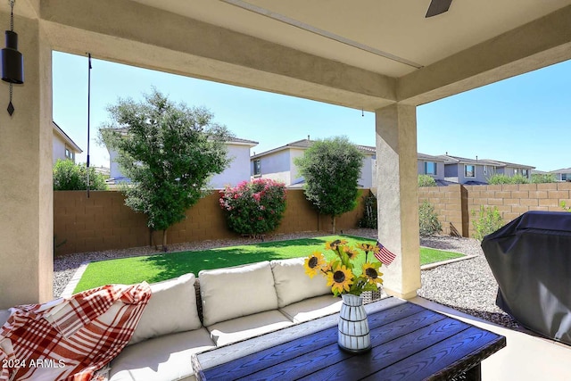 view of patio / terrace featuring an outdoor living space and area for grilling