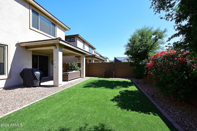 view of yard with a patio area and outdoor lounge area