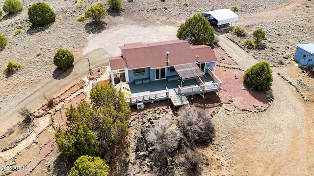 birds eye view of property with a desert view