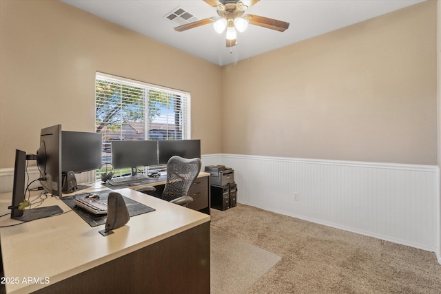 20464 E Bronco Dr, Queen Creek, AZ 85142 - home office featuring wainscoting, ceiling fan, and light carpet