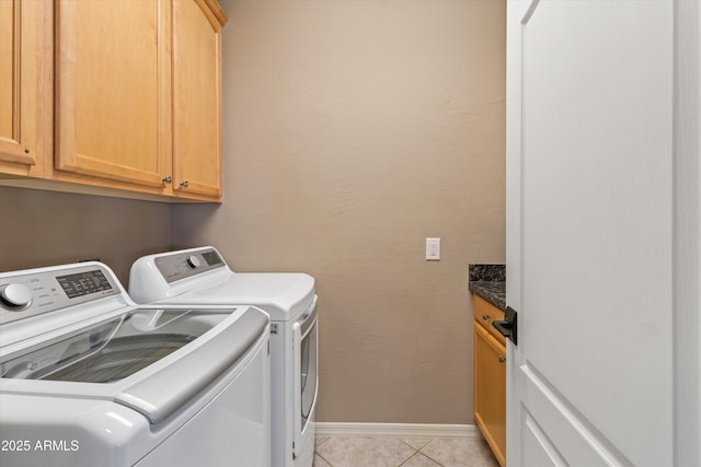 20464 E Bronco Dr, Queen Creek, AZ 85142 - laundry area with washing machine and clothes dryer, cabinet space, and light tile patterned flooring